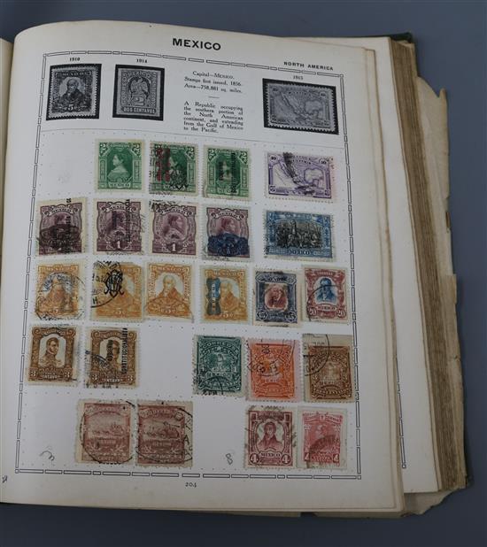 A dark green Triumph Stamp Album - all world used issues, including three pages of late Victorian - George V